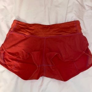 Red/orange lululemon shorts size 4. 2.5”